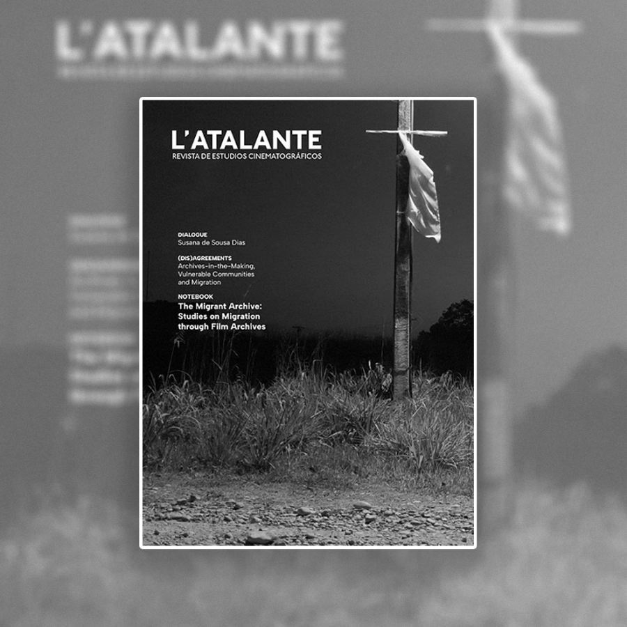A cover for an academic journal called L'Atalante that depicts a field at dusk with a pole on the right side of the picture with some cloth attached to that is blowing in the wind. The photo is in black and white and there is small very small text on the left hand side of the image which is not easily readable.