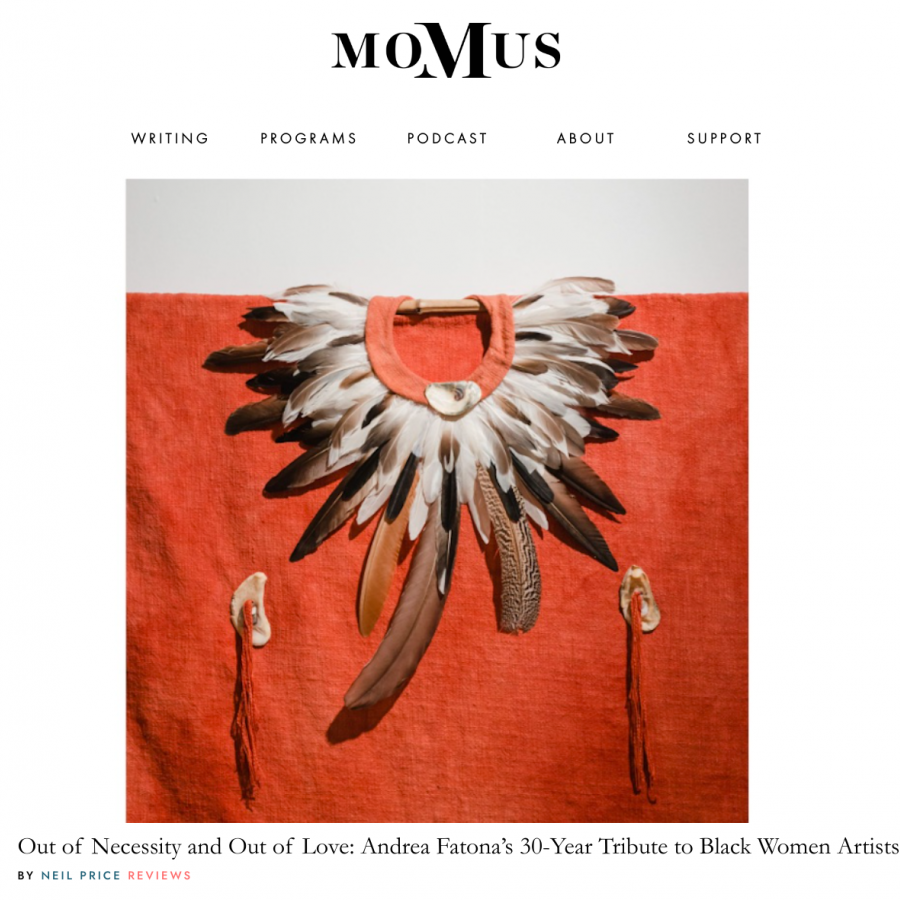 A square image featuring a screenshot of a website called Momus with an article title saying "Out of Necessity and Out of Love: Andrea Fatona’s 30-Year Tribute to Black Women Artists" and a photograph if a circle of feathers arranged on a piece of orange fabric hanging from a white wall.